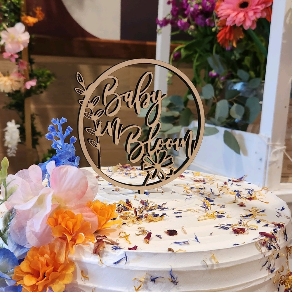 Baby in bloom cake topper